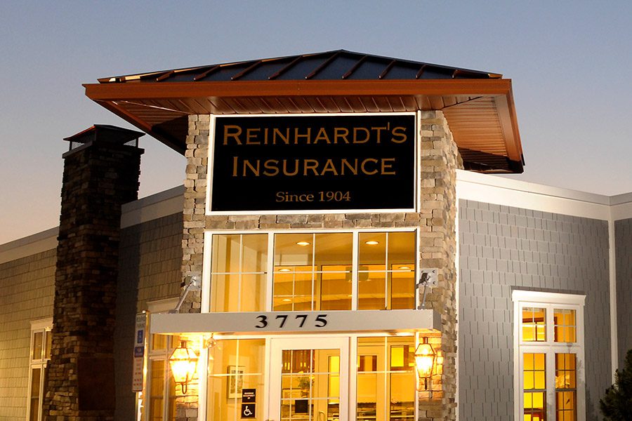 About Our Agency - Frontal View of the Reinhardt Agency Inc. Office Building at Night